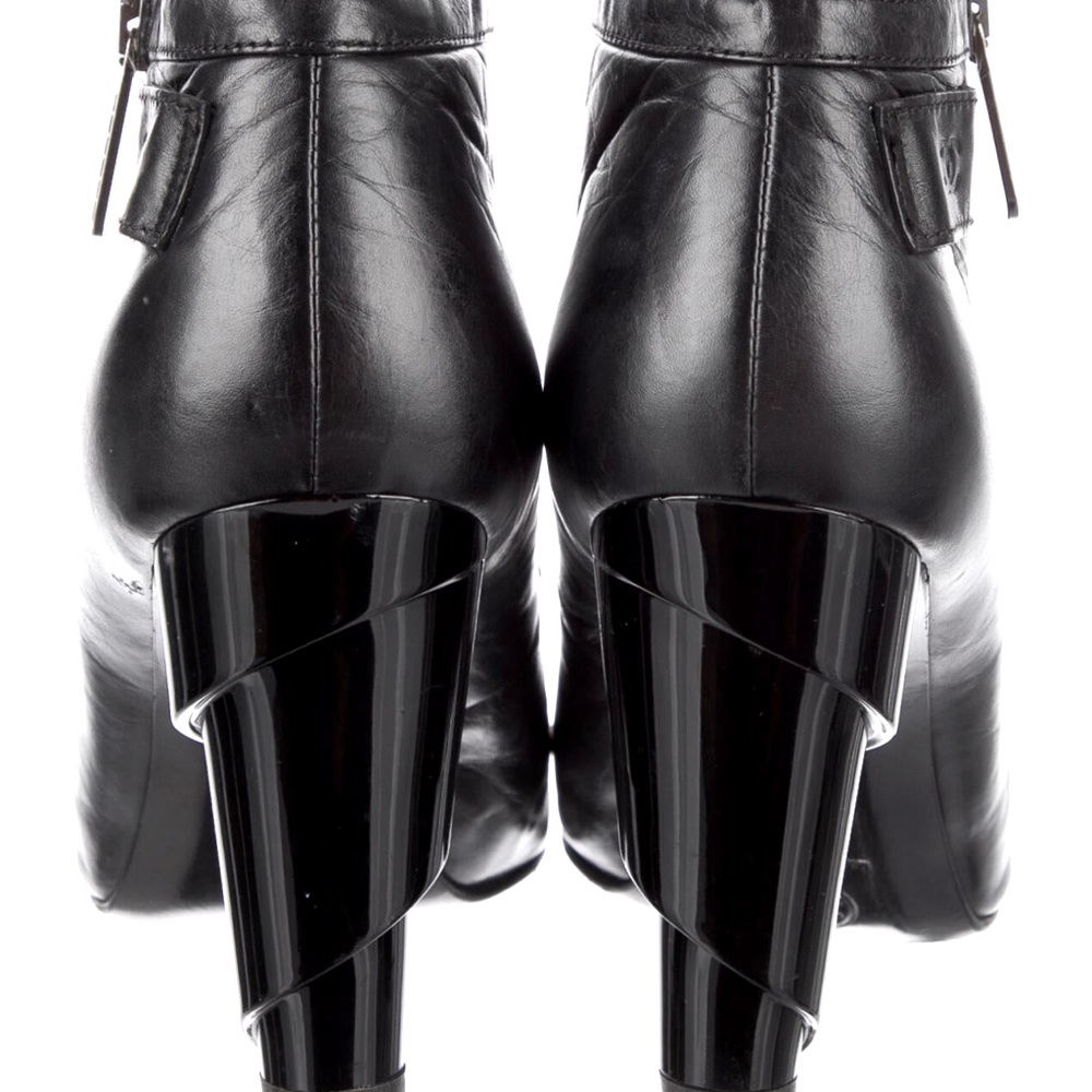 Chanel CC quilted leather boots